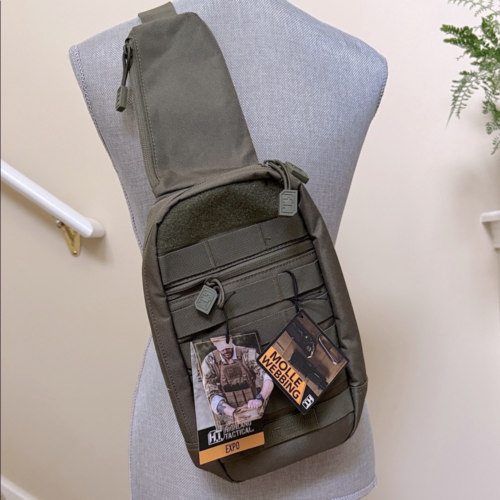 Tactical Sling Bag - Olive Green. Multiple pockets. Spacious compartments.